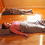 Lying on support for pranayama at Phillip island Yoga